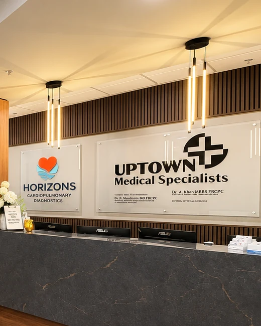 The Horizons Cardiopulmonary Diagnostics sign above the shared reception desk, next to the Uptown Medical Specialists sign